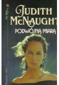 Podwójną miarą