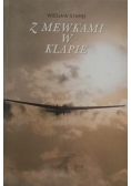 Z mewkami w klapie