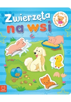 Maluch bawi się i przykleja. Zwierzęta na wsi