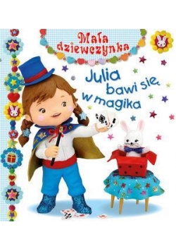 Mała dziewczynka - Julia bawi się w magika